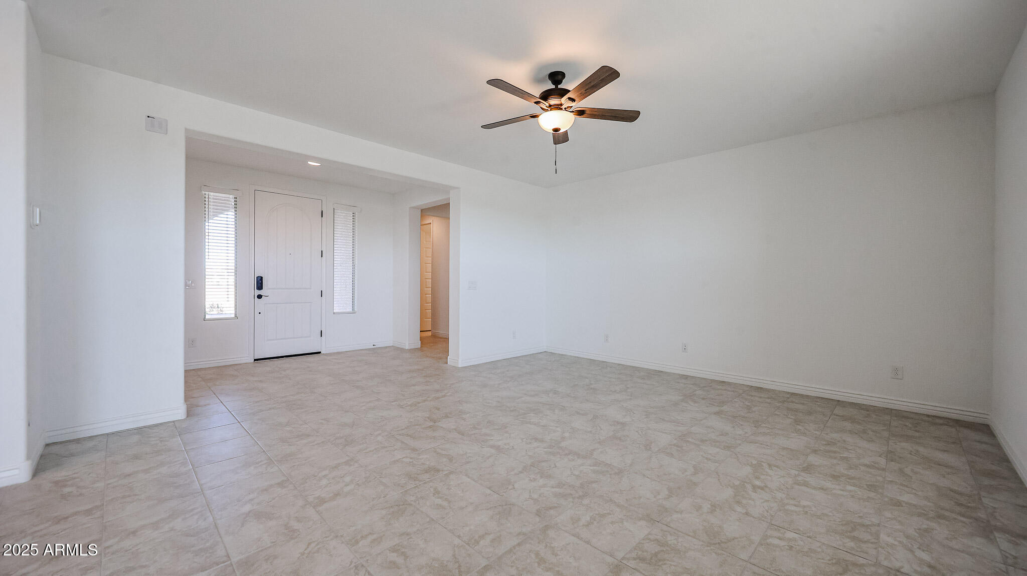 25051 North 171st Avenue Surprise, AZ 85387 - Photo 6 of 19 a view of an empty room