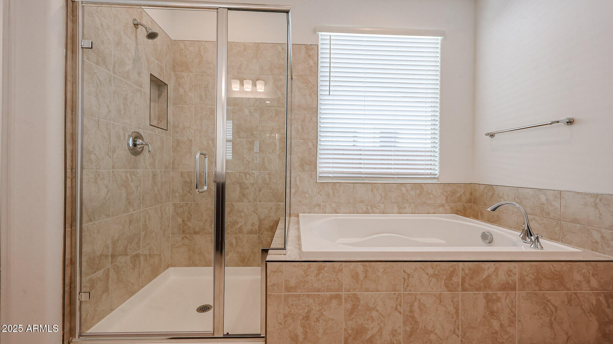 25051 North 171st Avenue Surprise, AZ 85387 - Photo 8 of 19 a white bath tub sitting next to a shower