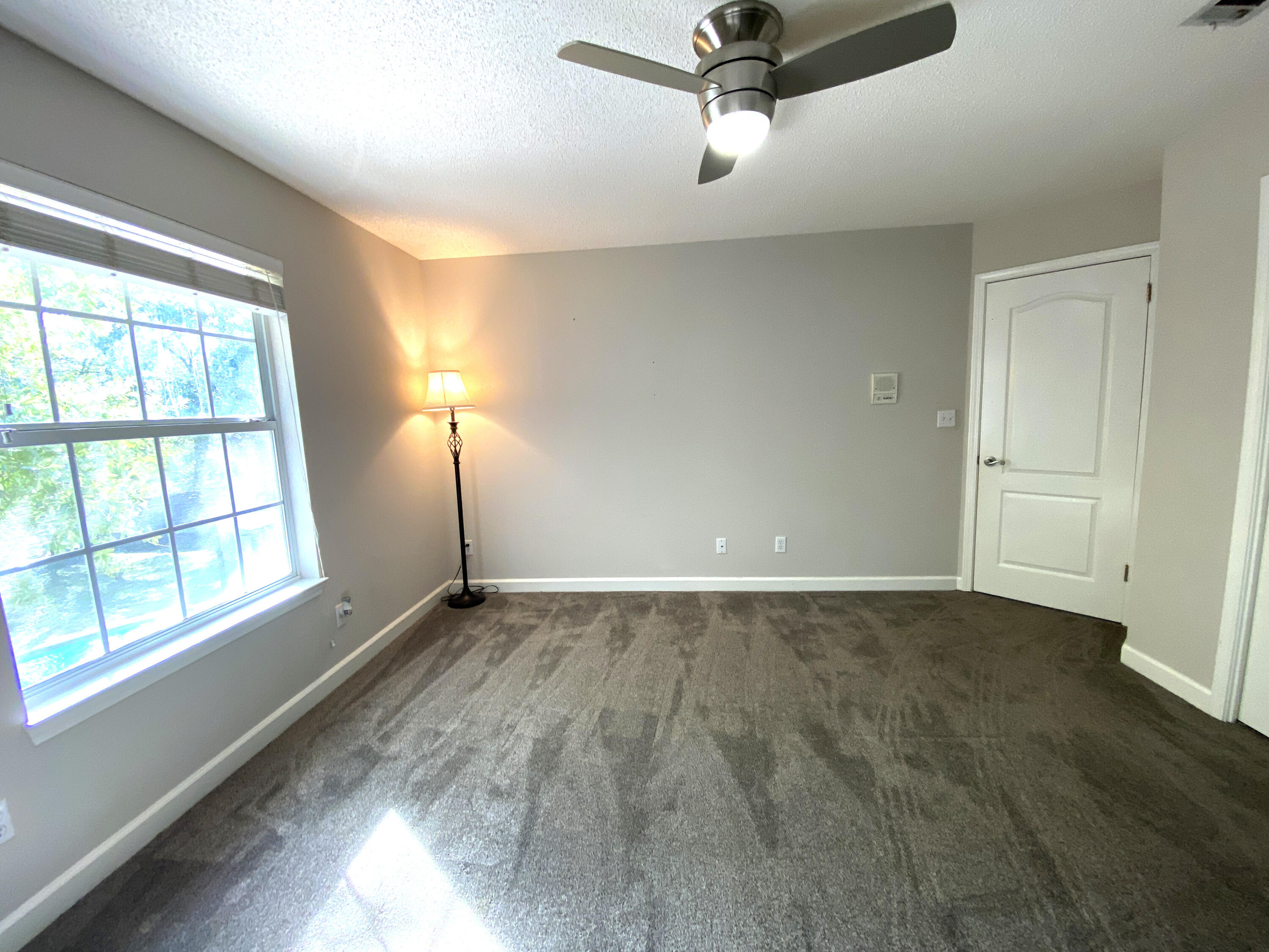 4466 Kingslynn Road Niceville, FL 32578 - Photo 49 of 77 a view of an empty room with a window