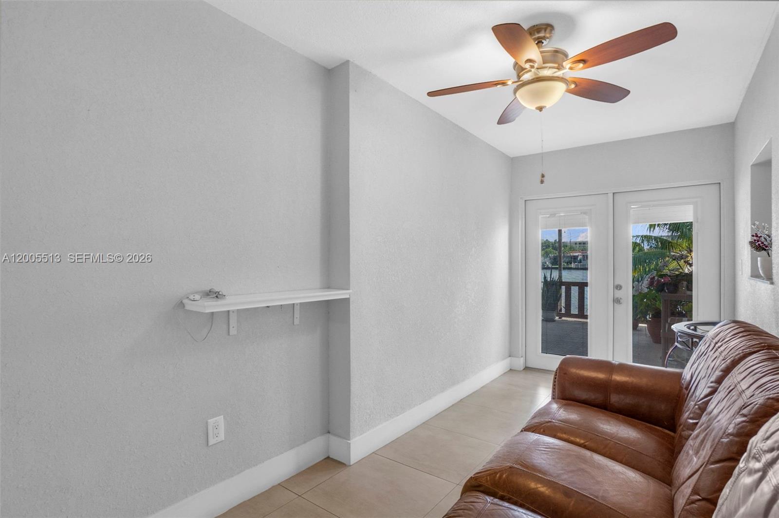 862 West 79th Street Hialeah, FL 33014 - Photo 15 of 34 a living room with furniture and a window