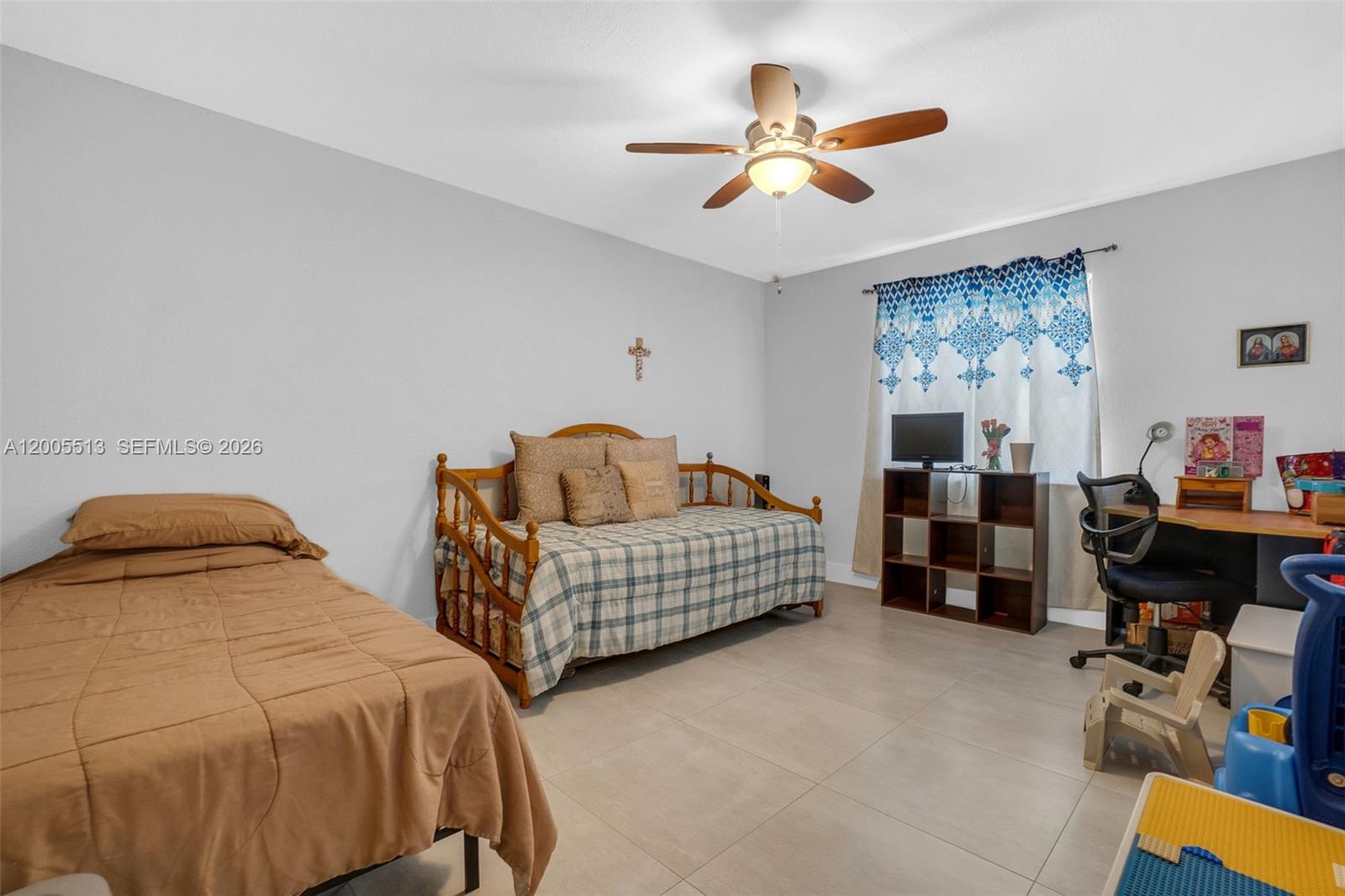 862 West 79th Street Hialeah, FL 33014 - Photo 22 of 34 a bedroom with bed and a window