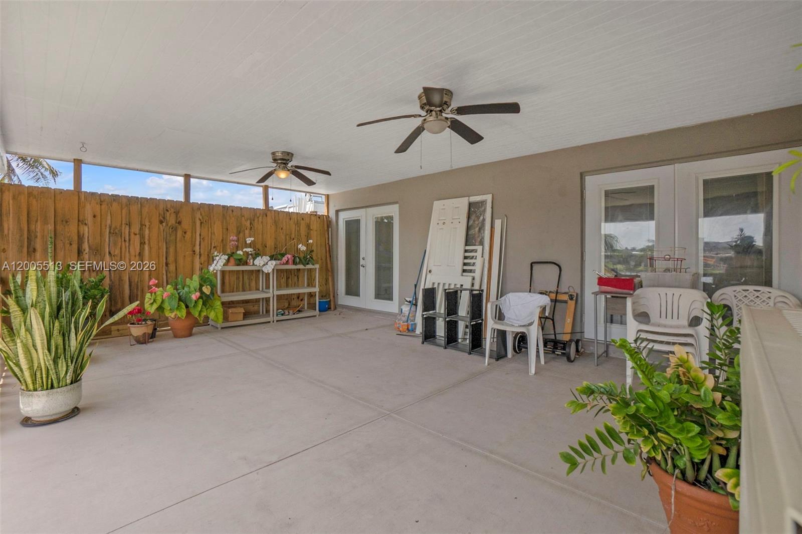 862 West 79th Street Hialeah, FL 33014 - Photo 26 of 34 a view of a livingroom with furniture and a window