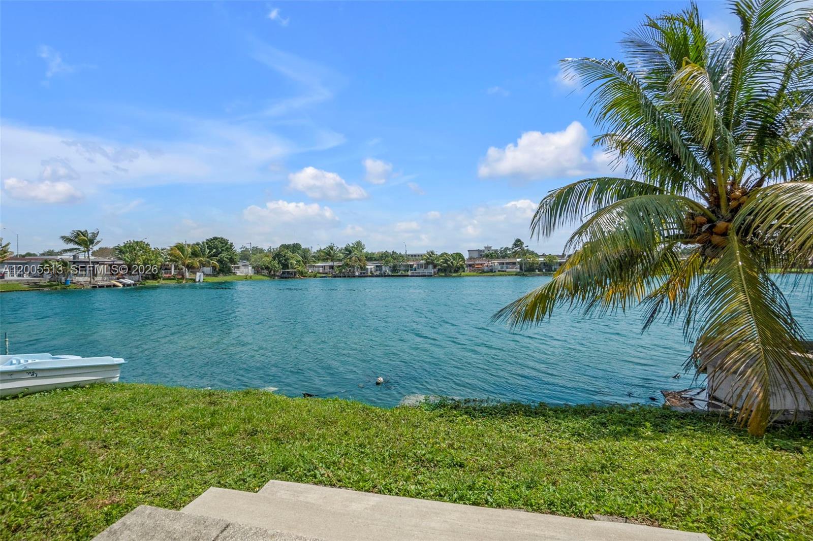 862 West 79th Street Hialeah, FL 33014 - Photo 27 of 34 a view of a lake with a big yard