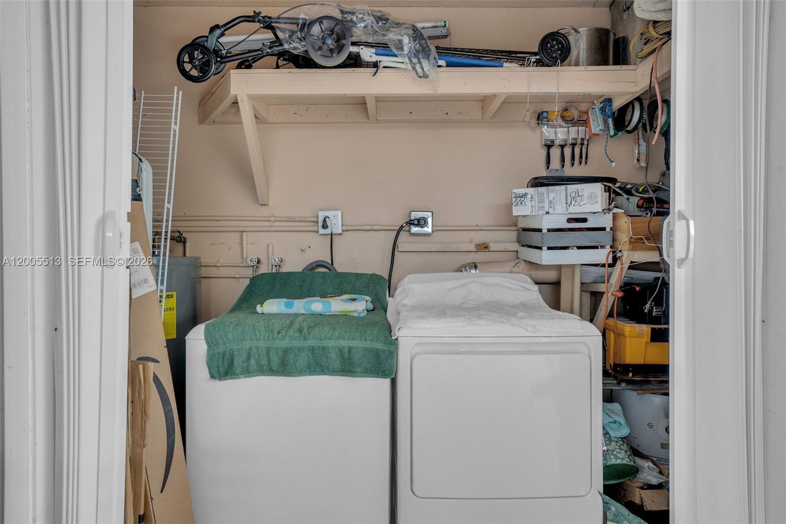 862 West 79th Street Hialeah, FL 33014 - Photo 28 of 34 a utility room with dryer and washer