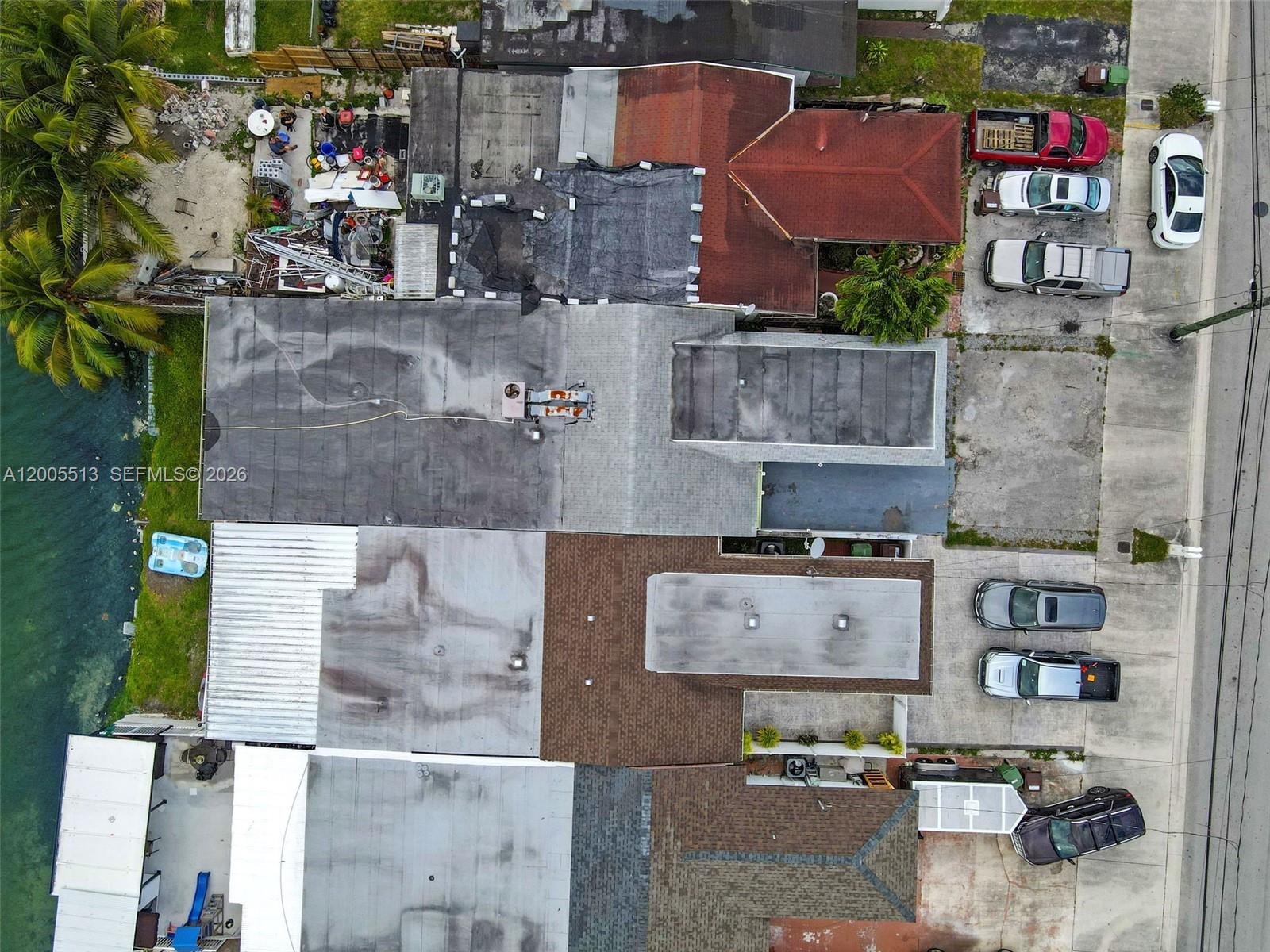 862 West 79th Street Hialeah, FL 33014 - Photo 32 of 34 an aerial view of residential houses with outdoor space