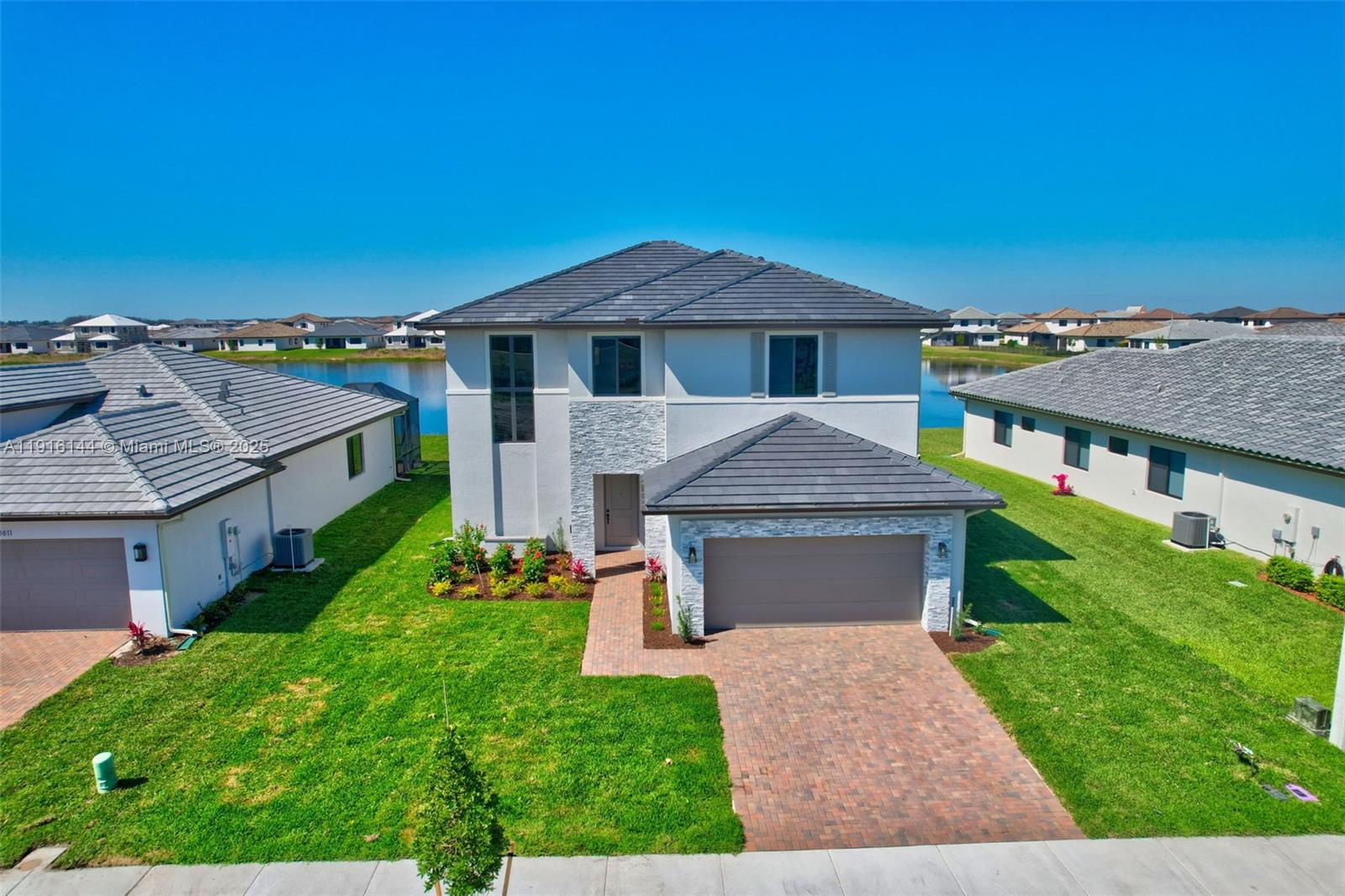front view of a house with a yard