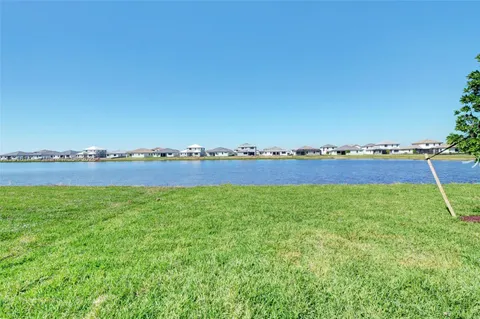 a view of a swimming pool and lake view