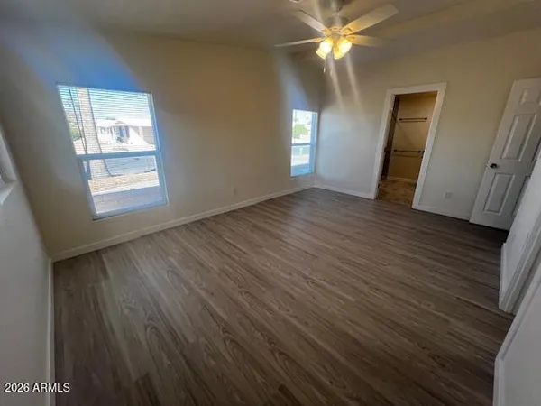a bathroom with a double vanity sink and mirror