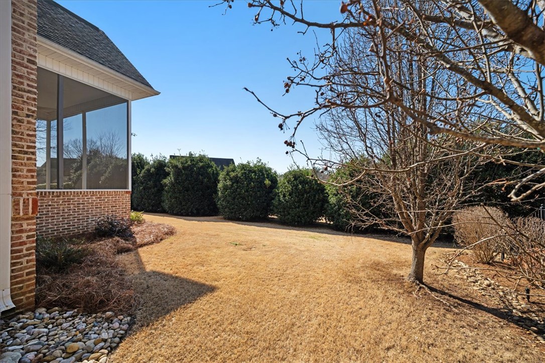 38 Angus Run Seneca, SC 29672 - Photo 36 of 46 This residence features a meticulously maintained yard, offering a tranquil outdoor retreat.