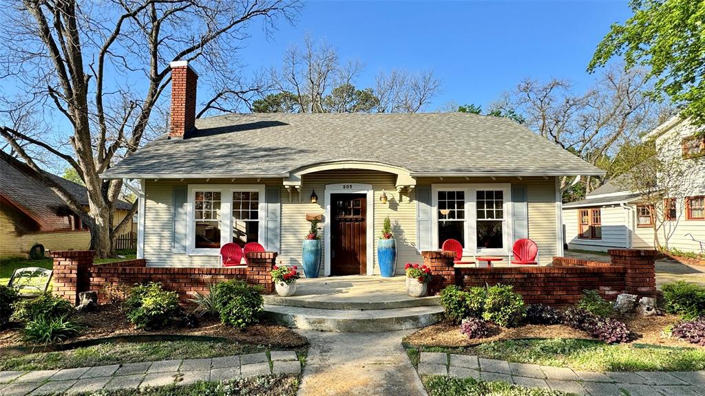 205 Elm Drive Terrell, TX 75160 - Photo 1 of 33 front view of a house with a porch