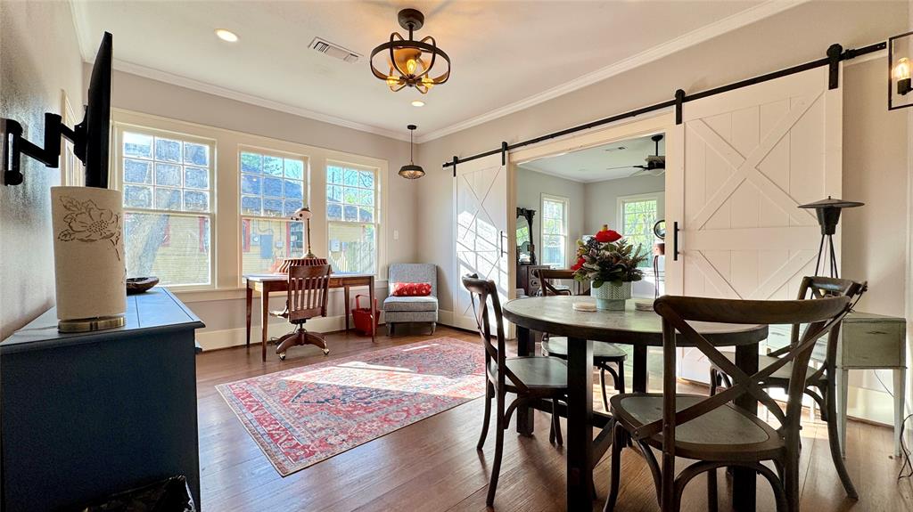 205 Elm Drive Terrell, TX 75160 - Photo 19 of 33 a view of a dining room with furniture window and wooden floor