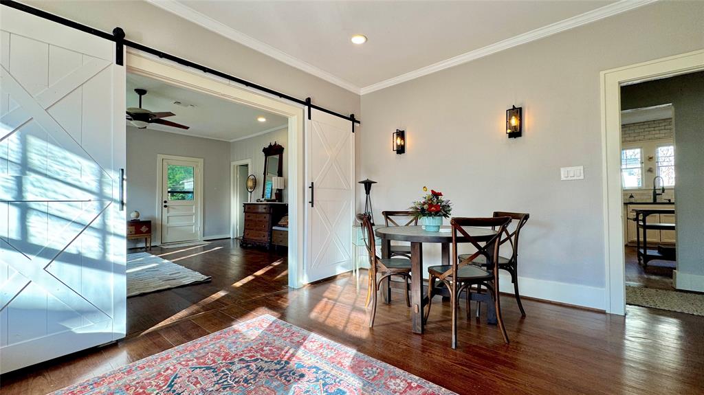 205 Elm Drive Terrell, TX 75160 - Photo 21 of 33 a view of a dining room with furniture and wooden floor