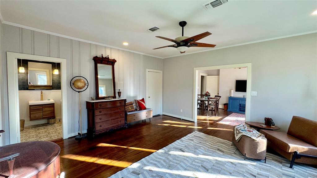 205 Elm Drive Terrell, TX 75160 - Photo 23 of 33 a living room with furniture a flat screen tv and a window