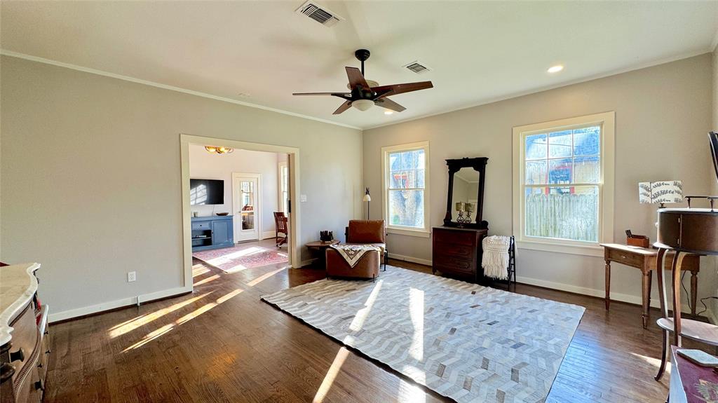 205 Elm Drive Terrell, TX 75160 - Photo 24 of 33 a living room with furniture and wooden floor