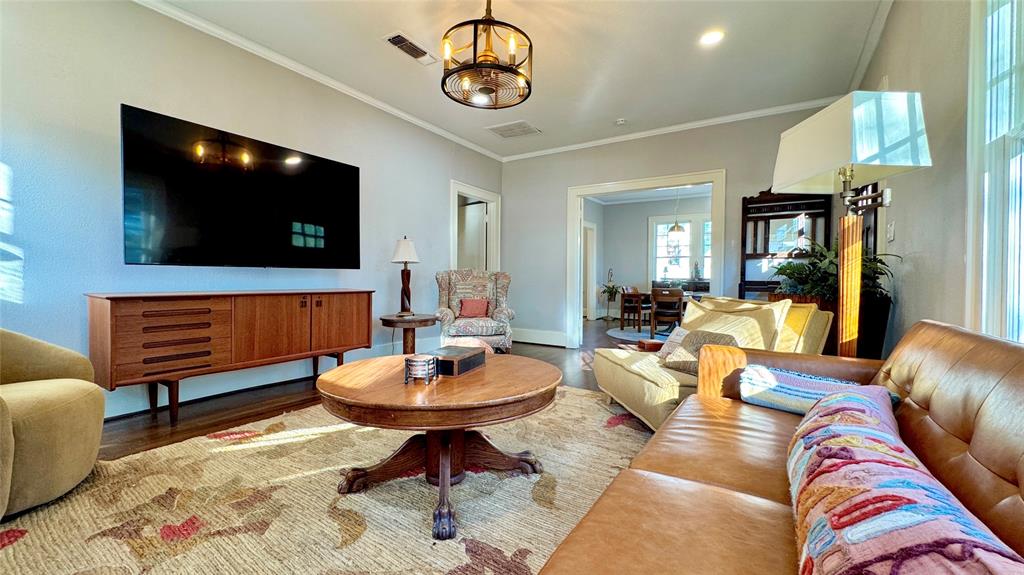 205 Elm Drive Terrell, TX 75160 - Photo 5 of 33 a living room with furniture and a flat screen tv