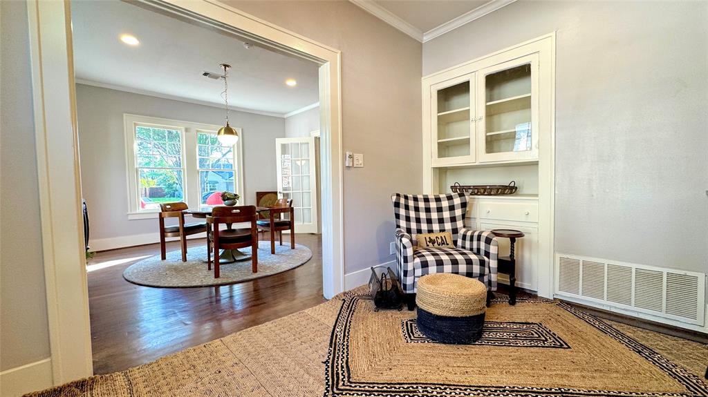 205 Elm Drive Terrell, TX 75160 - Photo 10 of 33 a living room with furniture and a wooden floor