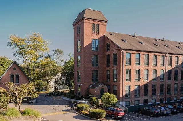 a front view of a building with street view