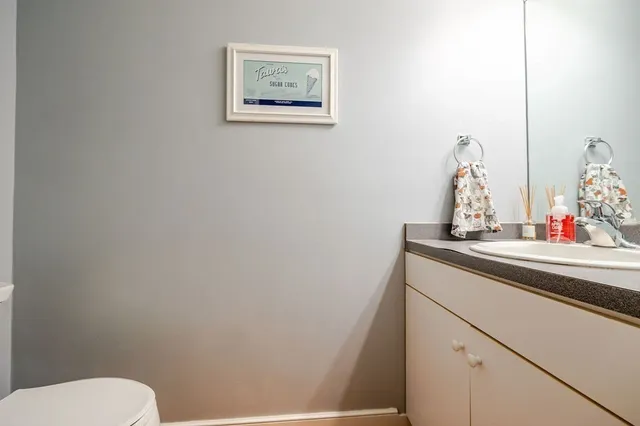a view of entryway with wooden floor and stairs