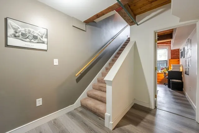 a kitchen with a stove and a refrigerator