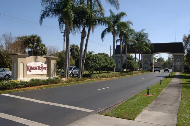 a view of a dining hall with many windows