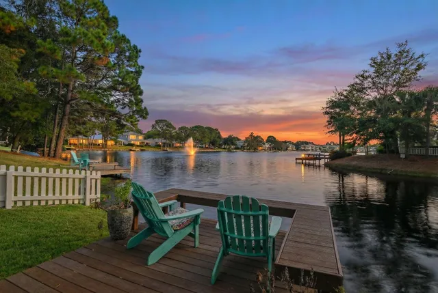 a bedroom with a bed and a fireplace