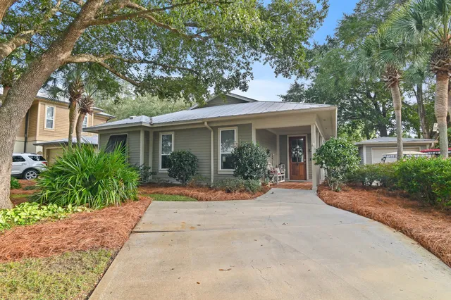 a view of a lake with a house in the background