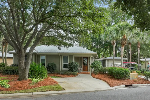 a view of a lake with a house in the background