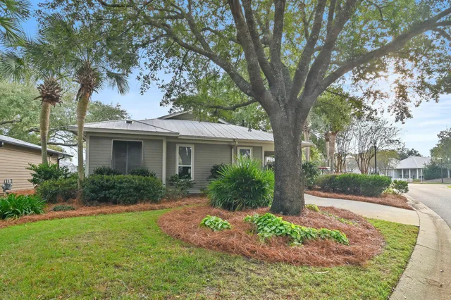 an aerial view of residential house with outdoor space and lake view