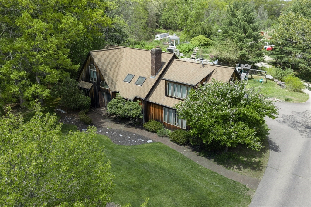 42 Pine Acres Road Foxboro, MA 02035 - Photo 29 of 40 an aerial view of a house with a yard and trees all around