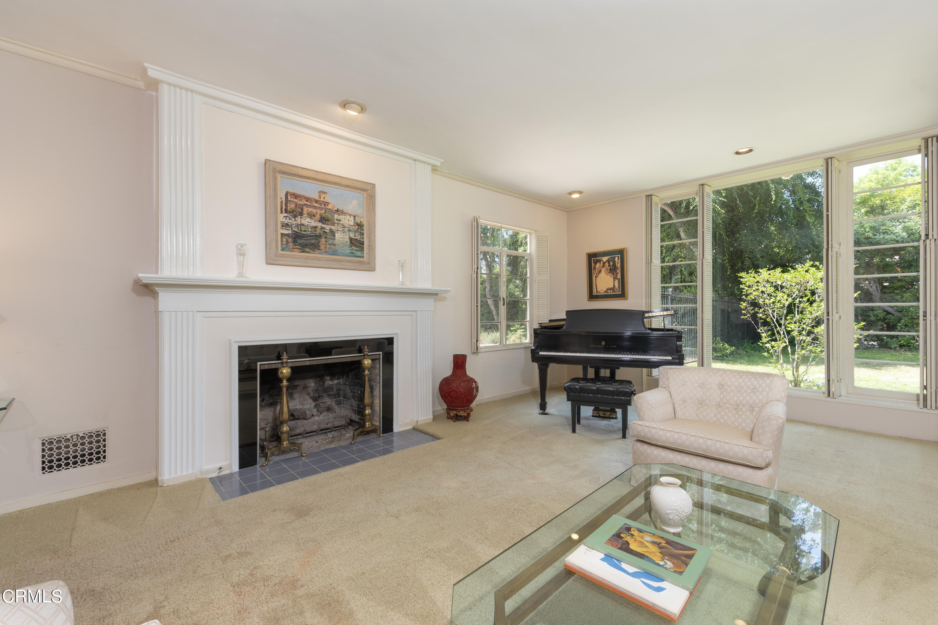 3287 Lombardy Road Pasadena, CA 91107 - Photo 14 of 59 a living room with furniture and a fireplace