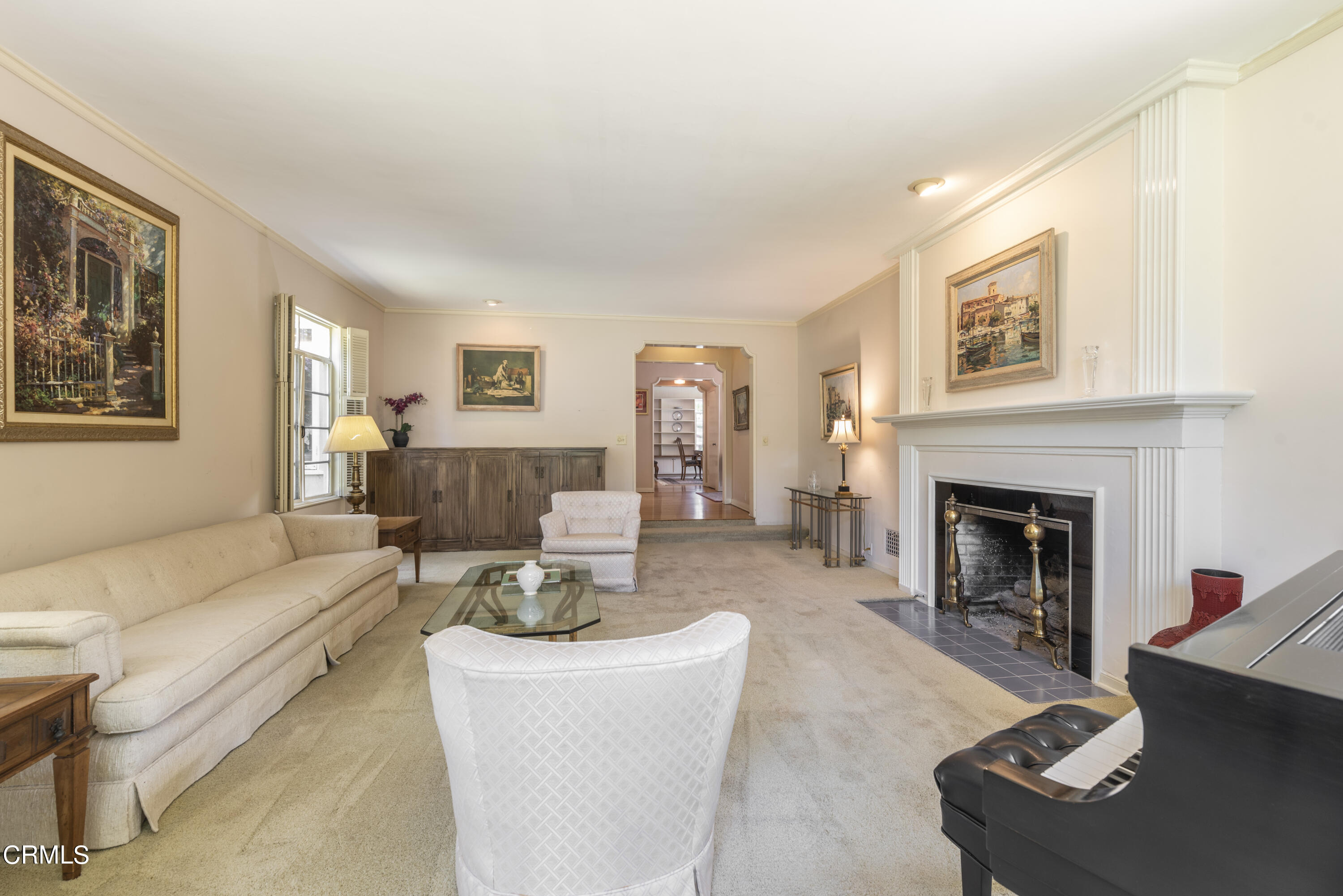 3287 Lombardy Road Pasadena, CA 91107 - Photo 15 of 59 a living room with furniture and a fireplace