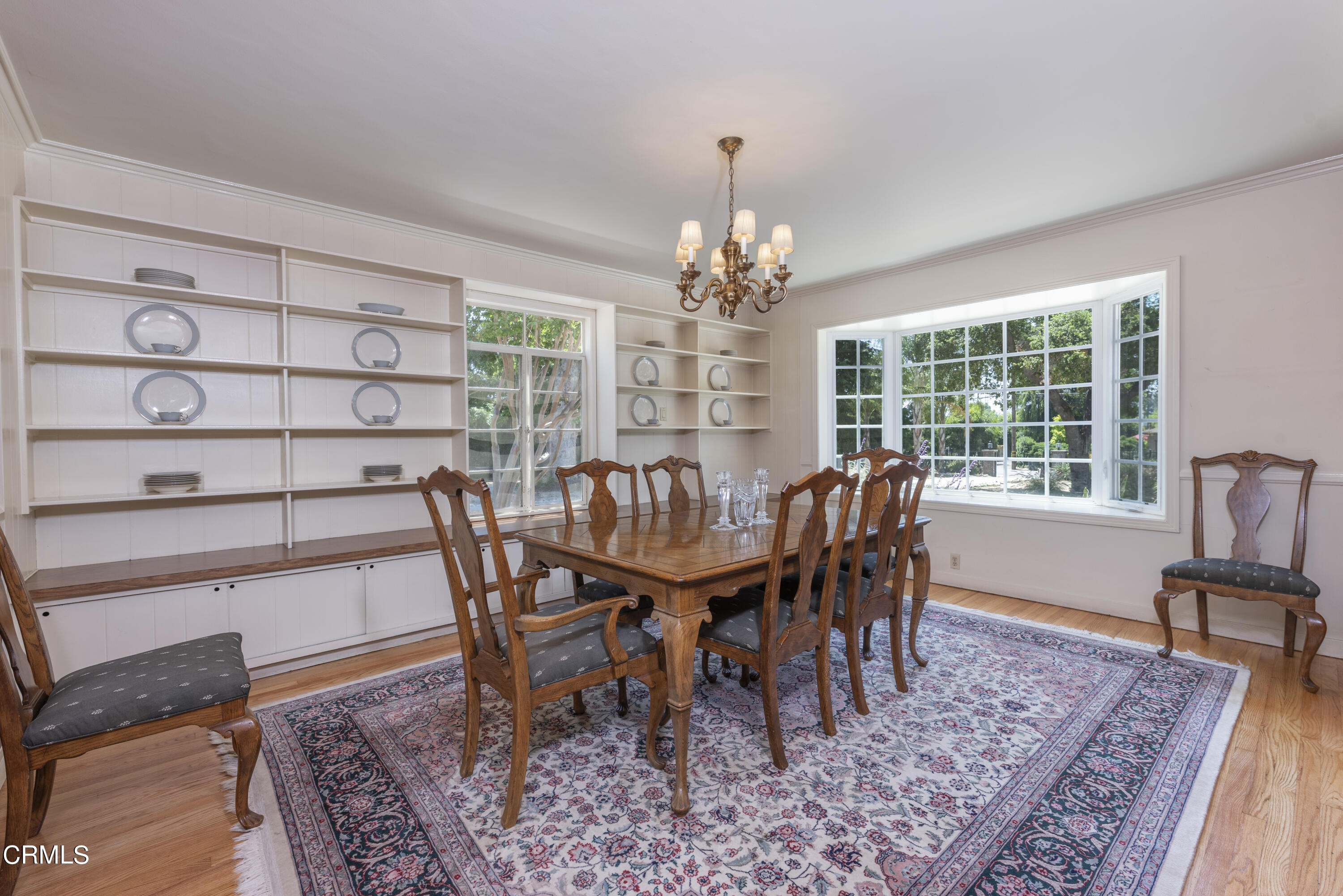 3287 Lombardy Road Pasadena, CA 91107 - Photo 16 of 59 a view of a dining room with furniture wooden floor and chandelier