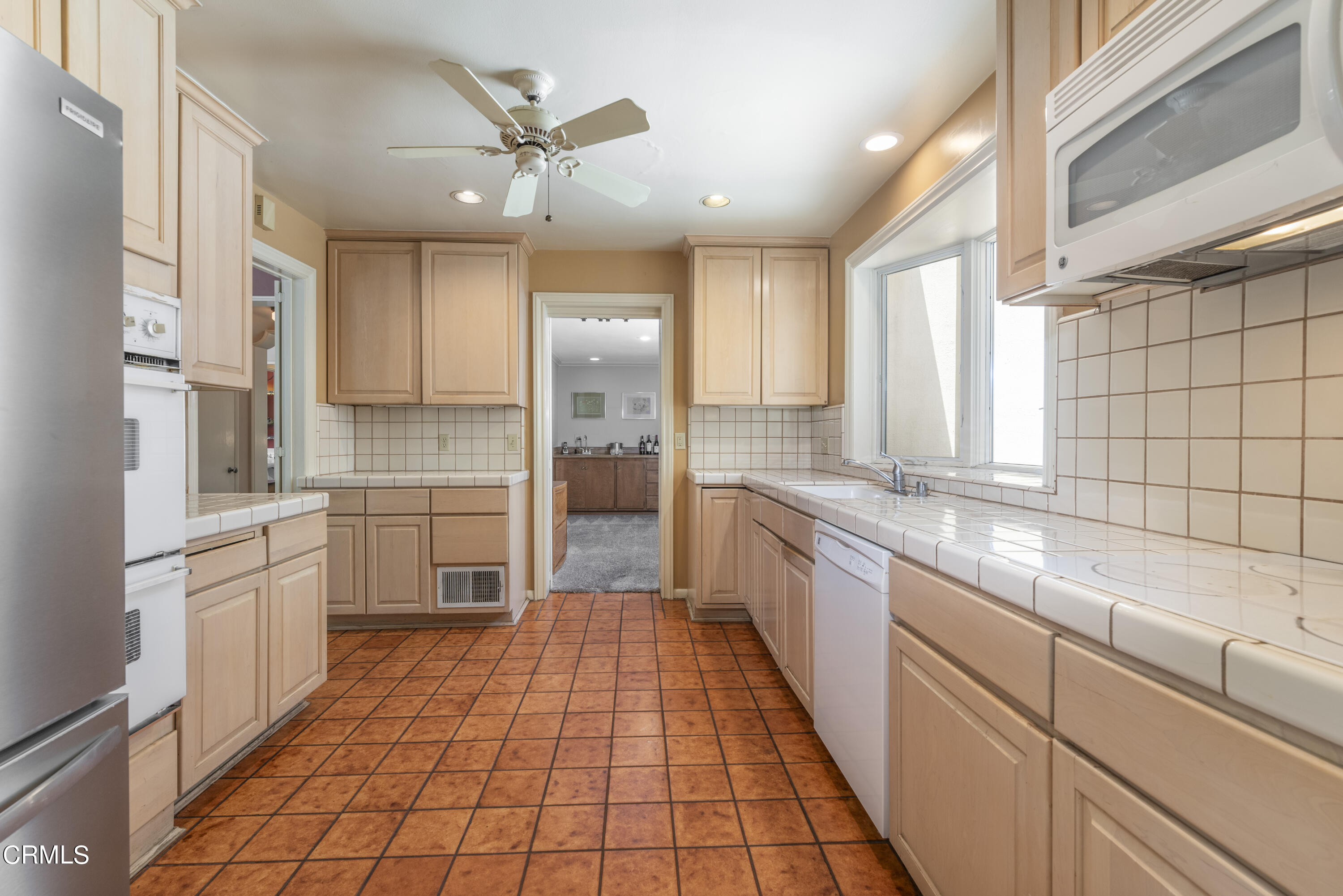 3287 Lombardy Road Pasadena, CA 91107 - Photo 19 of 59 a large kitchen with a sink and cabinets