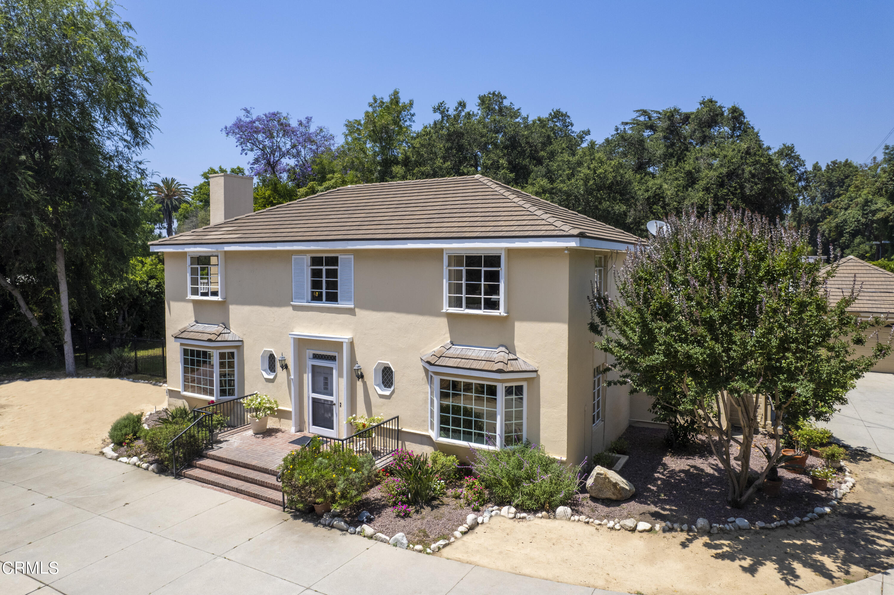 3287 Lombardy Road Pasadena, CA 91107 - Photo 2 of 59 a front view of a house with a yard