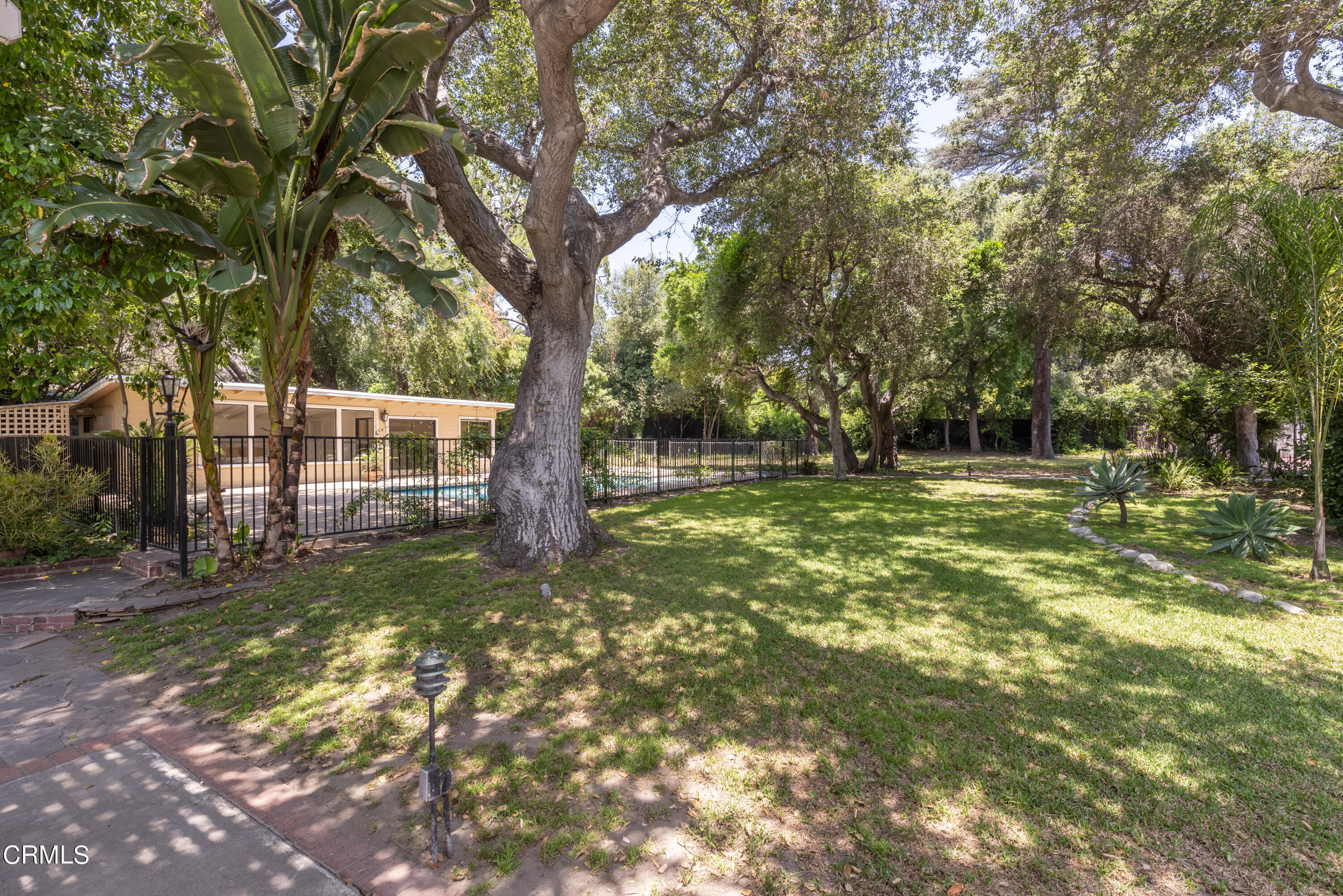 3287 Lombardy Road Pasadena, CA 91107 - Photo 27 of 59 a backyard of a house with lots of green space