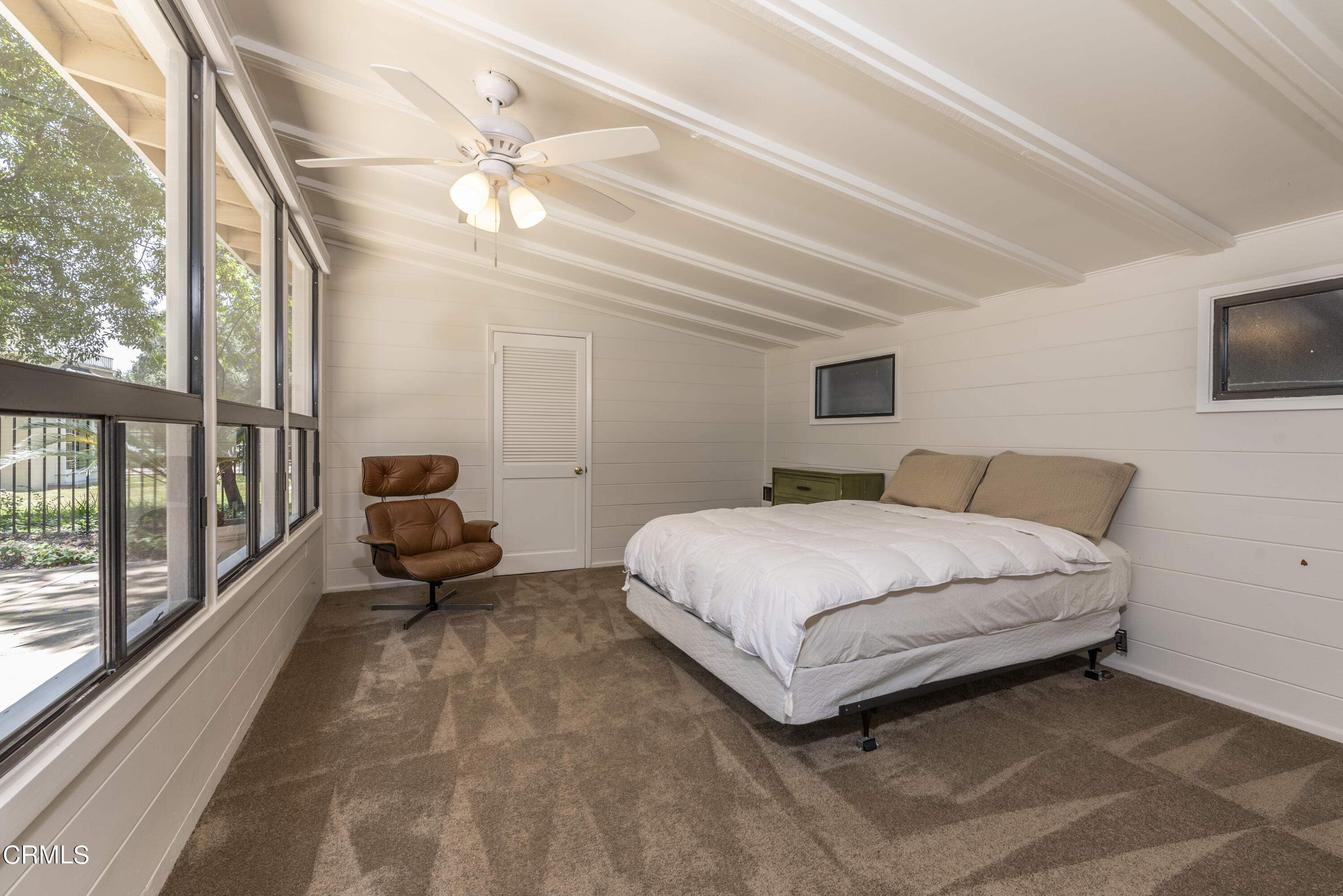 3287 Lombardy Road Pasadena, CA 91107 - Photo 31 of 59 a spacious bedroom with a bed and a large window