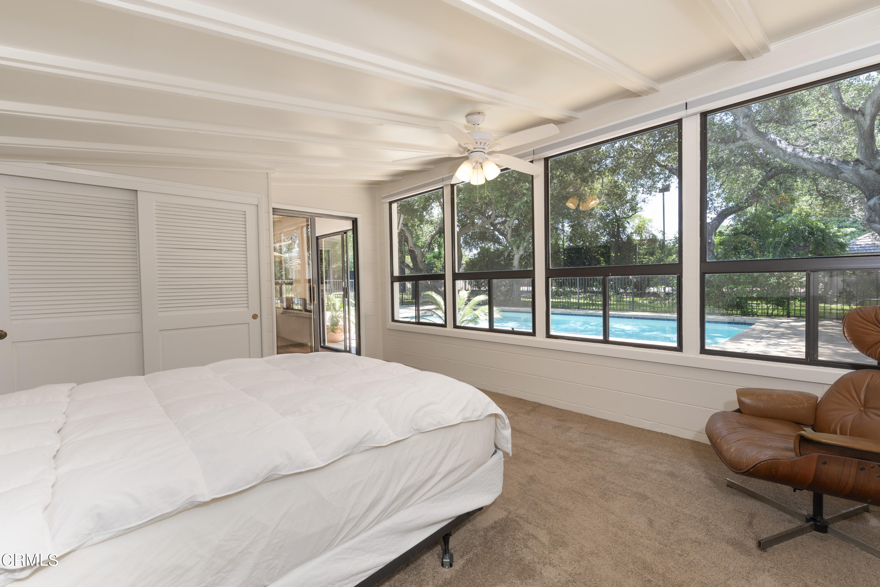 3287 Lombardy Road Pasadena, CA 91107 - Photo 33 of 59 a bedroom with a large bed and a large window