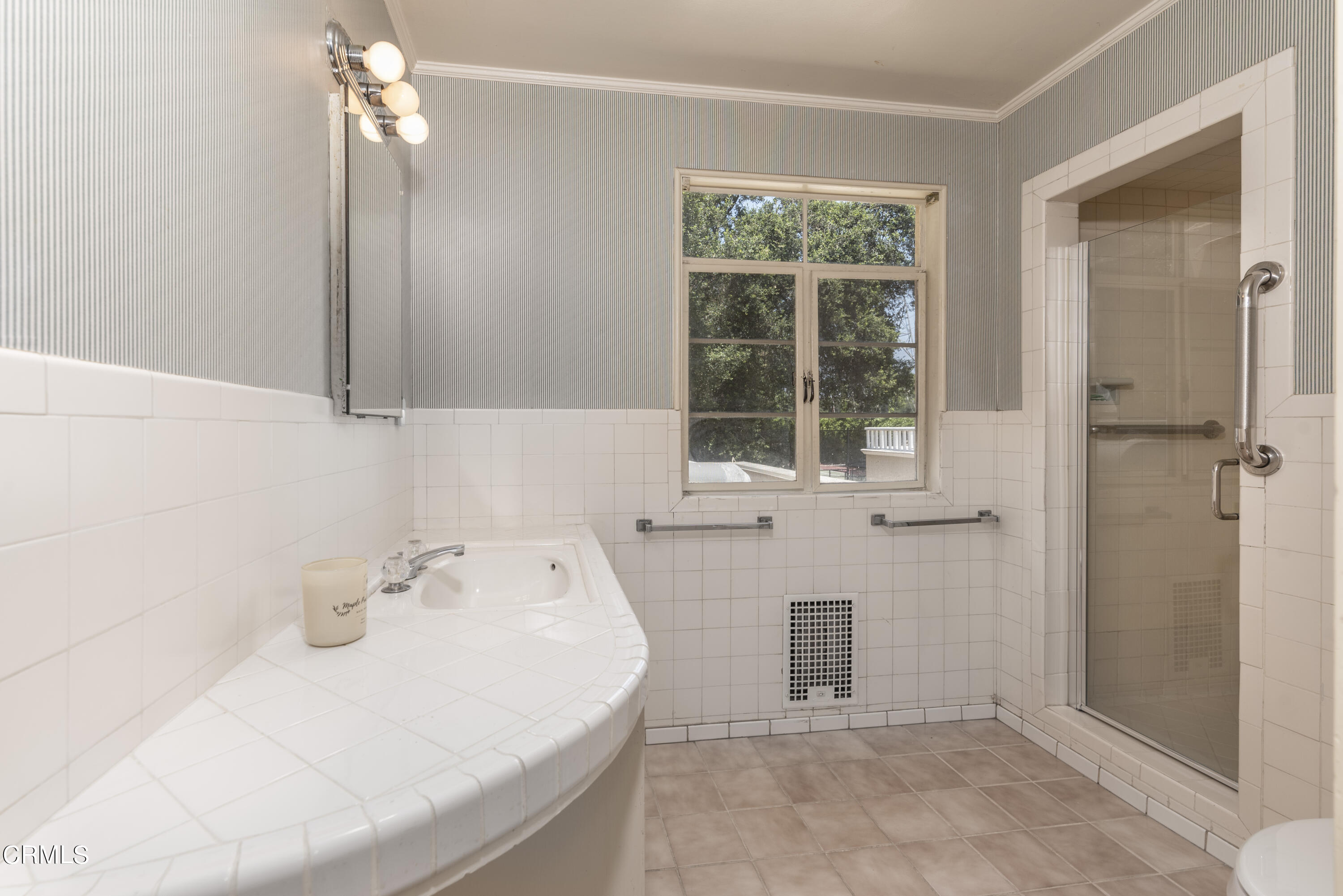 3287 Lombardy Road Pasadena, CA 91107 - Photo 38 of 59 a bathroom with a sink and a mirror
