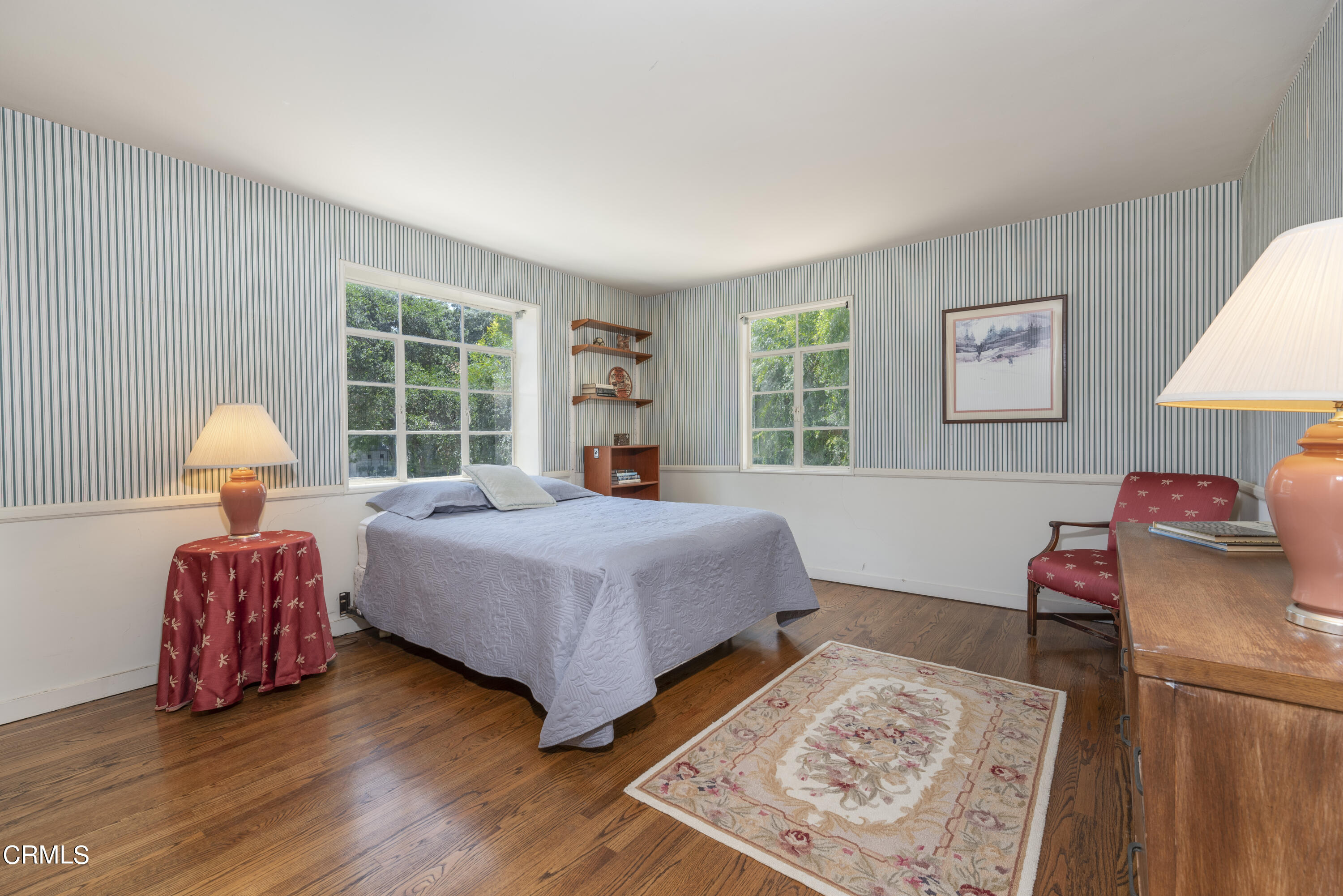 3287 Lombardy Road Pasadena, CA 91107 - Photo 39 of 59 a bedroom with a bed window and a table