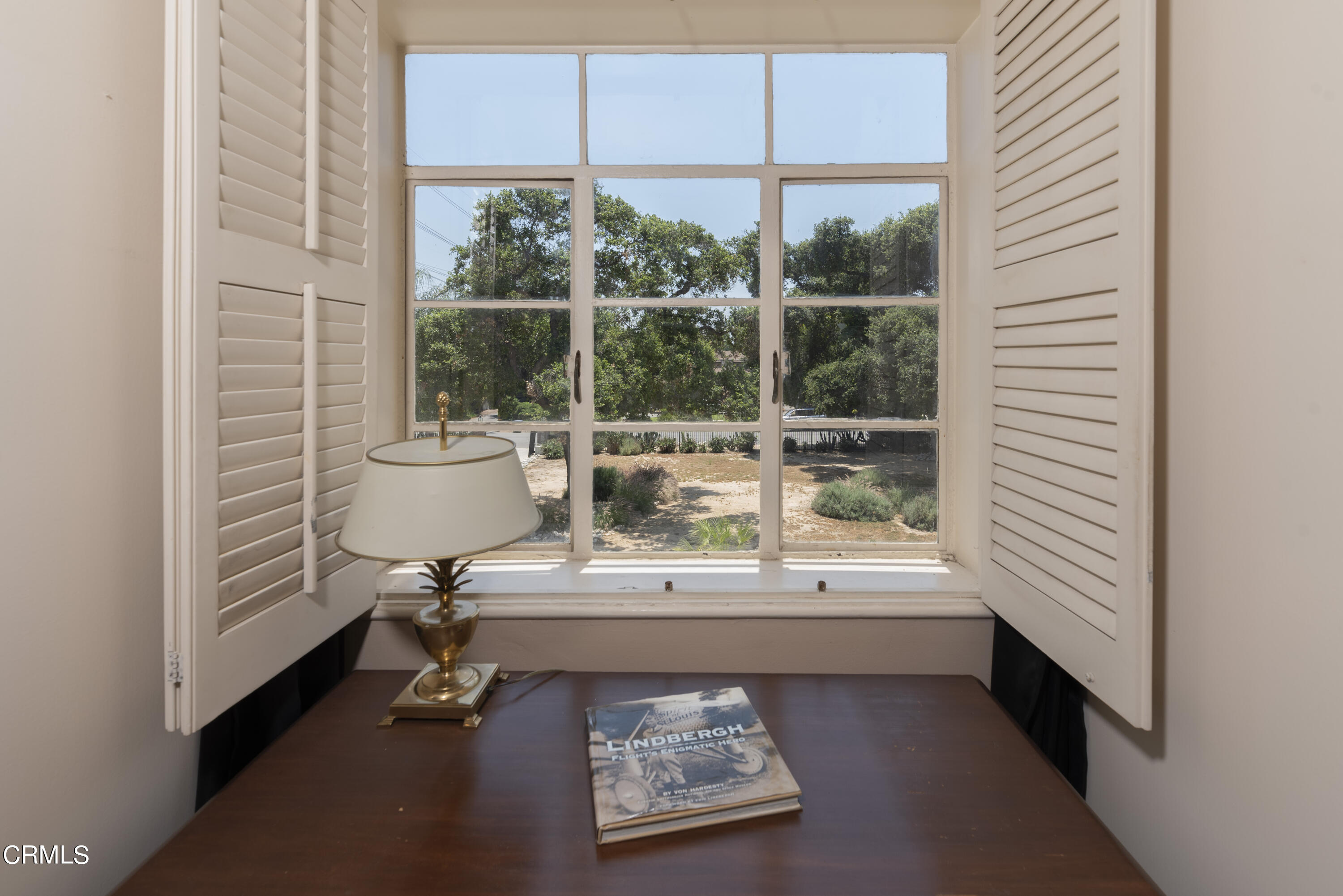 3287 Lombardy Road Pasadena, CA 91107 - Photo 42 of 59 a room with a table and a window