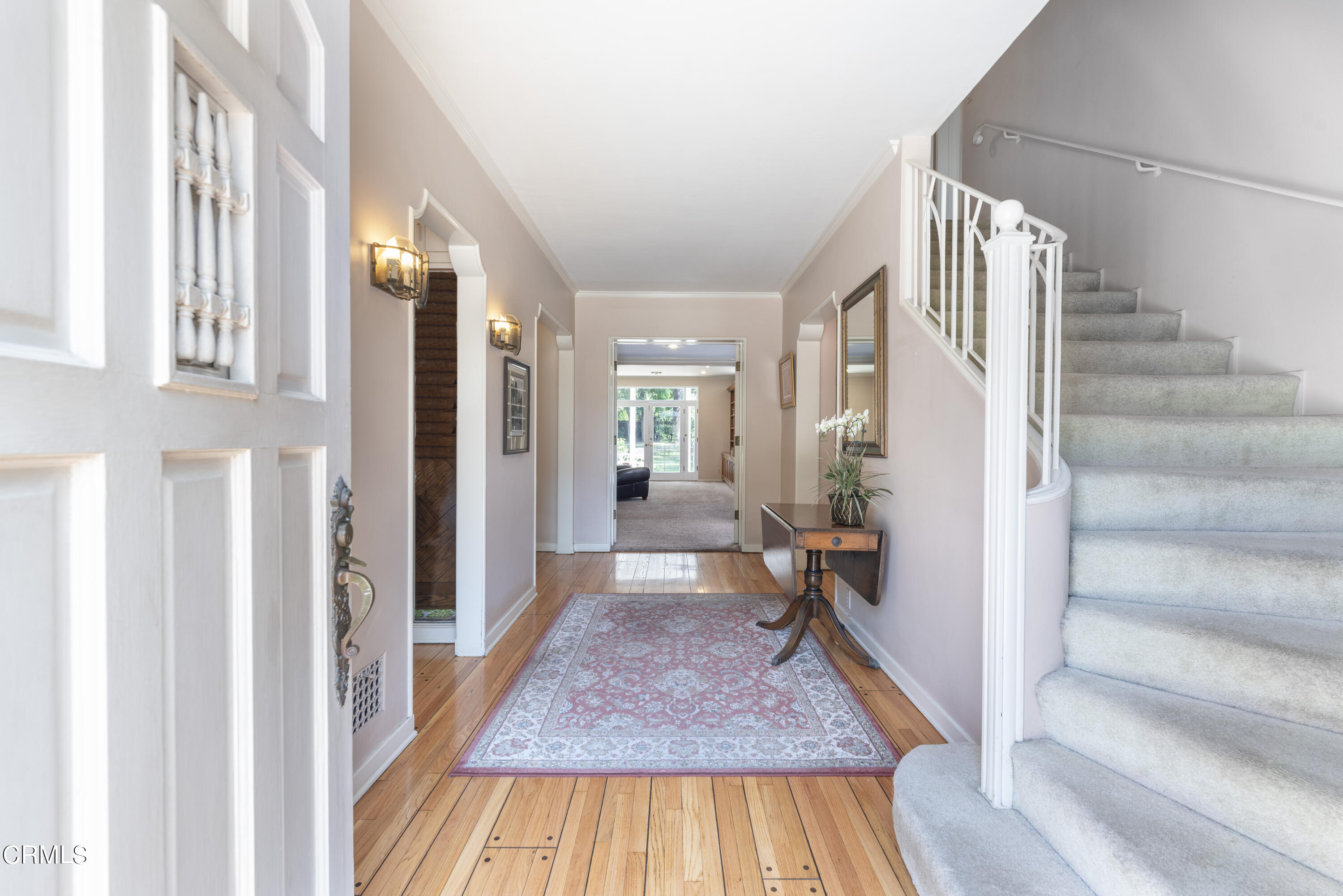 3287 Lombardy Road Pasadena, CA 91107 - Photo 7 of 59 a view of a hallway with wooden floor and entryway