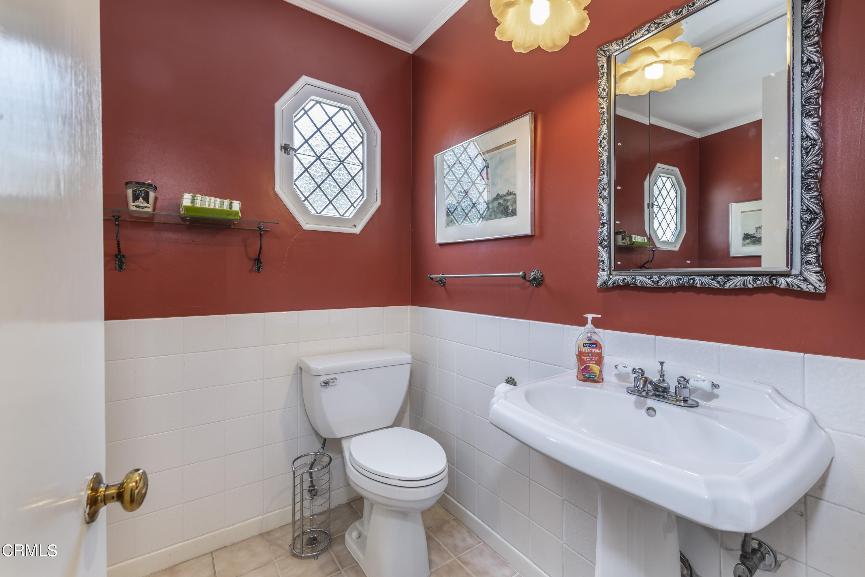 3287 Lombardy Road Pasadena, CA 91107 - Photo 10 of 59 a bathroom with a toilet a sink and mirror