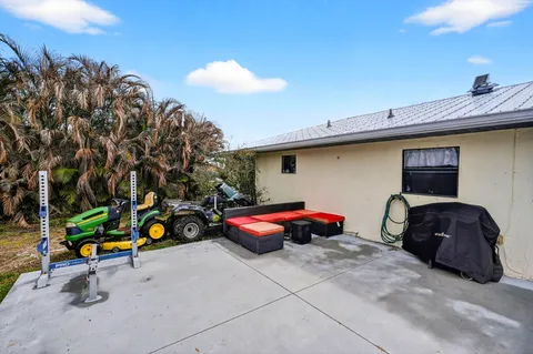 a front view of a house with parking space