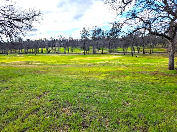 a view of swimming pool with an outdoor space and seating area