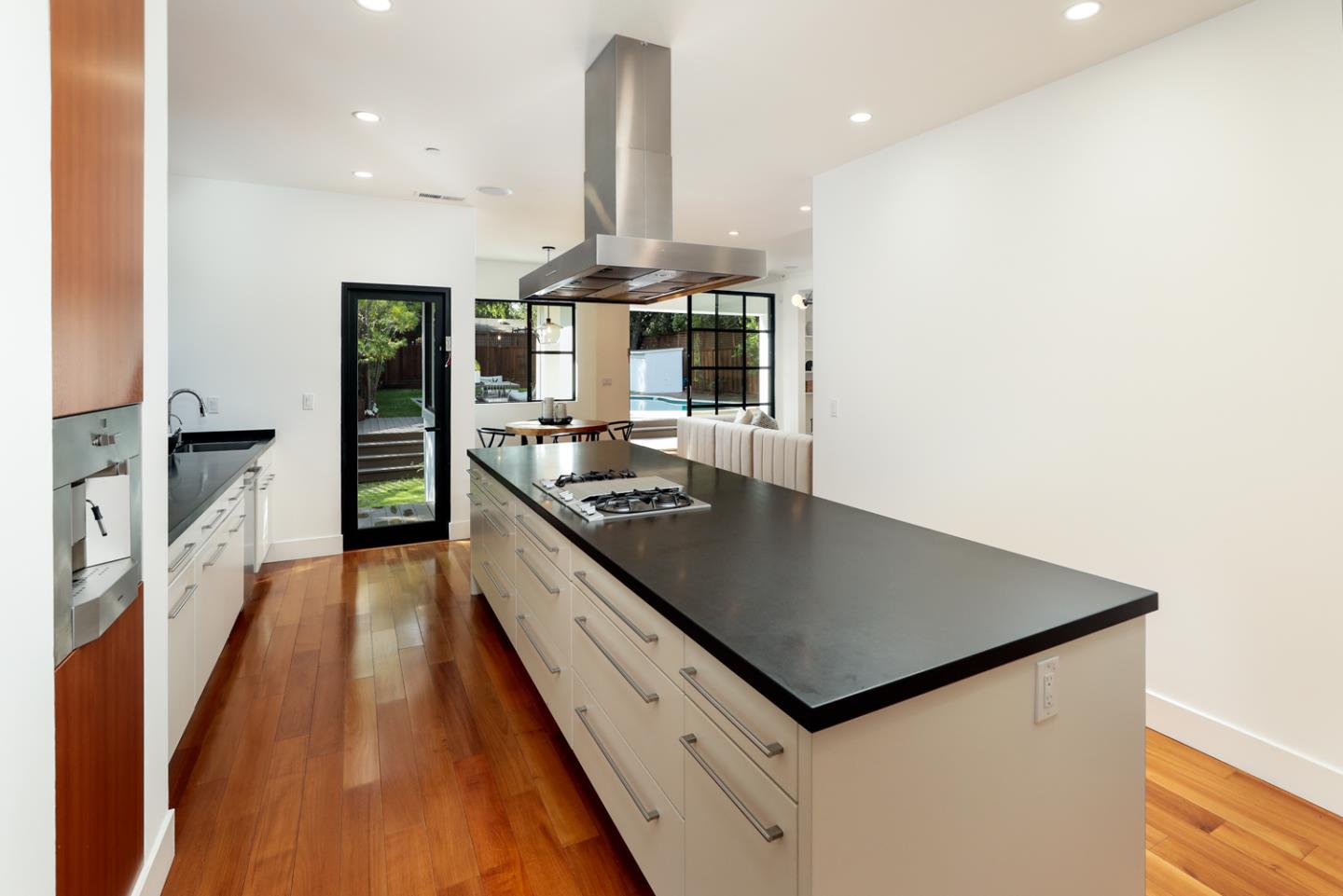 1136 Miramonte Avenue Los Altos, CA 94024 - Photo 13 of 58 a kitchen with stainless steel appliances granite countertop a stove a sink and a refrigerator