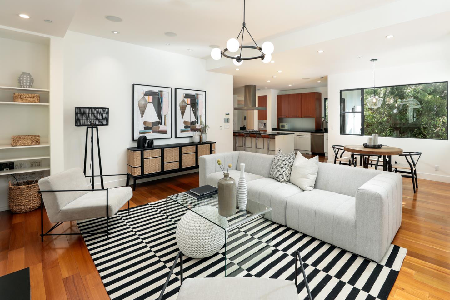 1136 Miramonte Avenue Los Altos, CA 94024 - Photo 15 of 58 a living room with furniture a flat screen tv and a chandelier