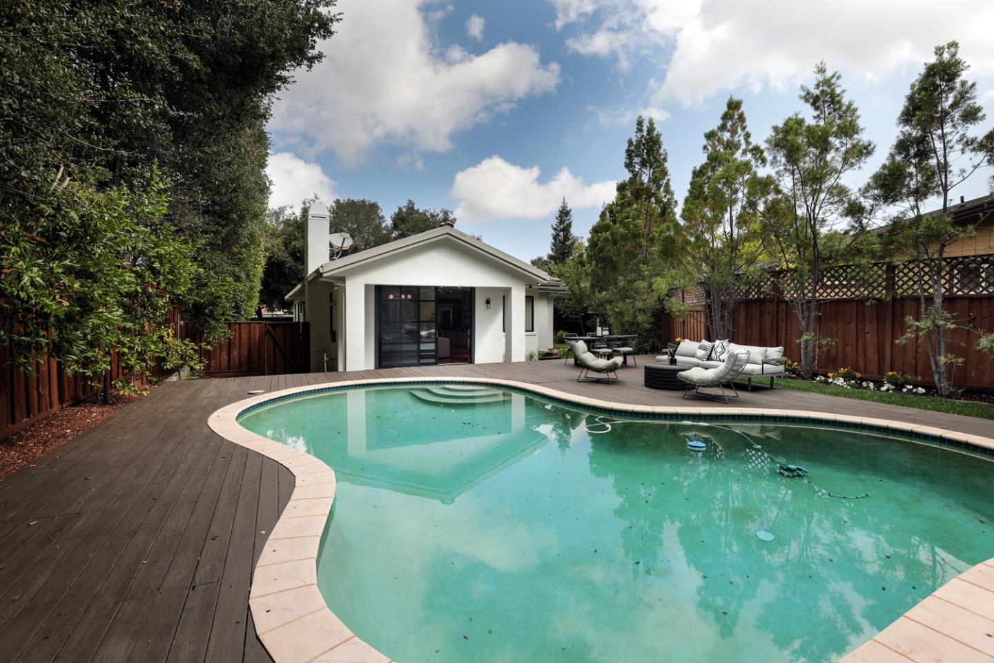 1136 Miramonte Avenue Los Altos, CA 94024 - Photo 20 of 58 a view of a house with swimming pool and sitting area