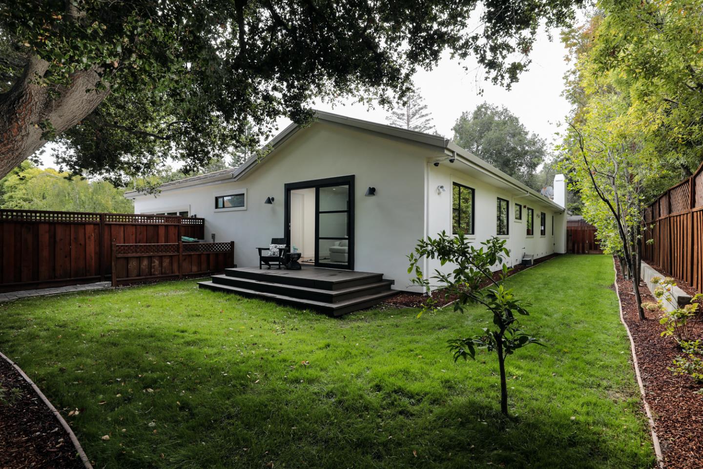1136 Miramonte Avenue Los Altos, CA 94024 - Photo 22 of 58 a view of a house with backyard and a garden
