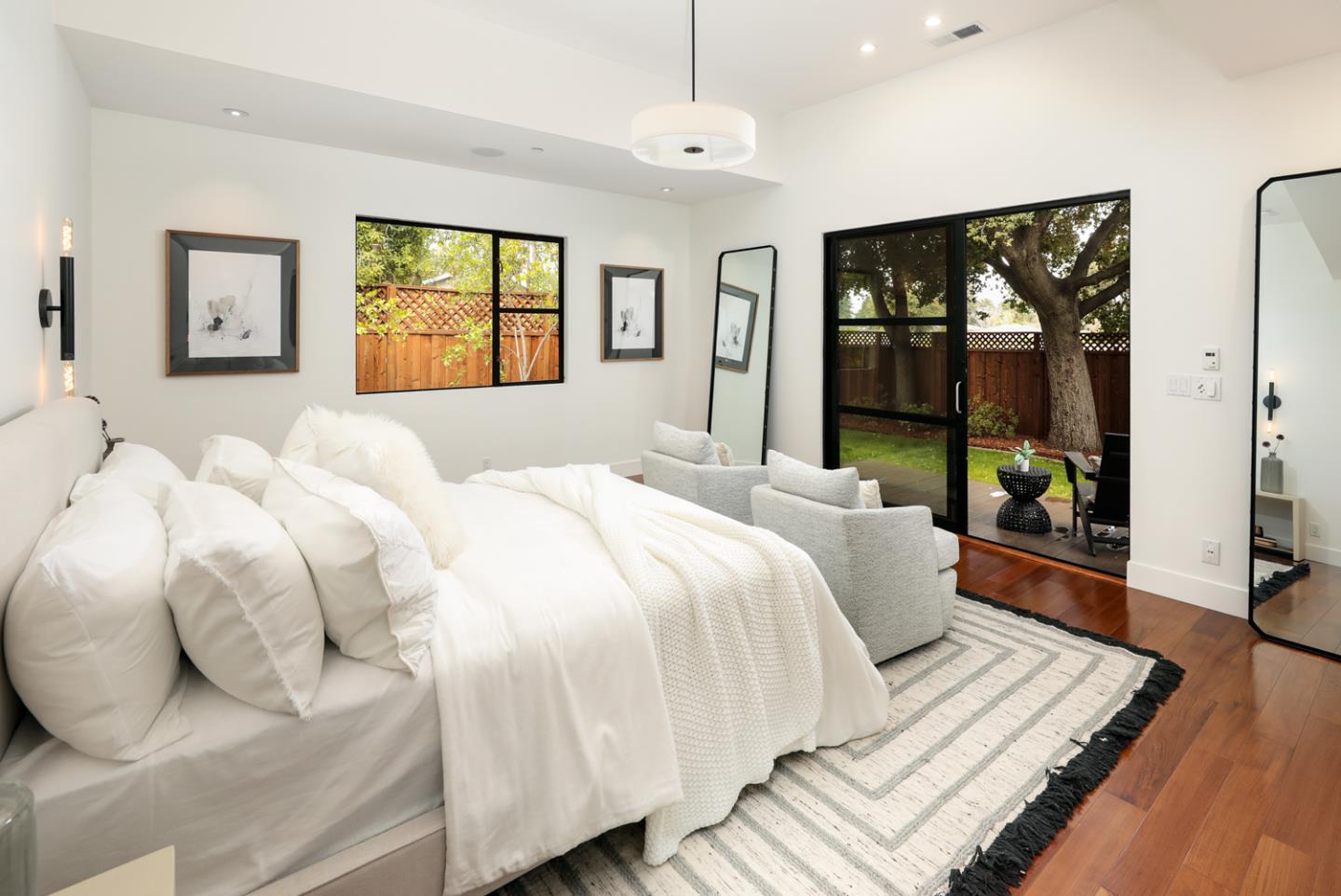 1136 Miramonte Avenue Los Altos, CA 94024 - Photo 25 of 58 a bedroom with a large bed and a window