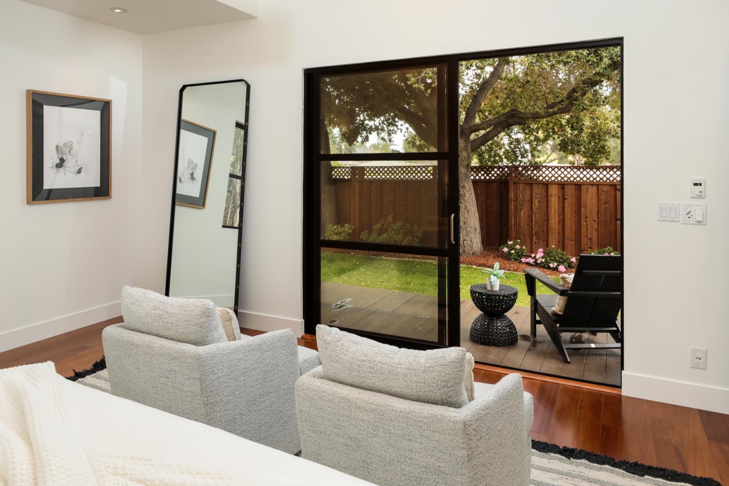 1136 Miramonte Avenue Los Altos, CA 94024 - Photo 29 of 58 a living room with furniture and a large window